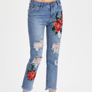 Distress Denim With Floral Appliques